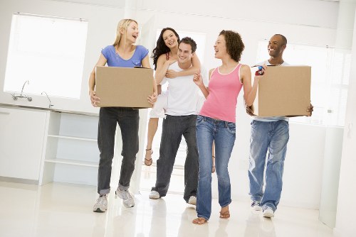 Moving team handling household removals in Finchley near local residential streets