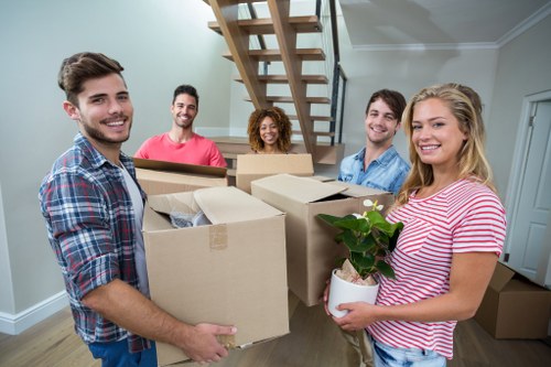 Furniture removals team handling a house move in Finchley