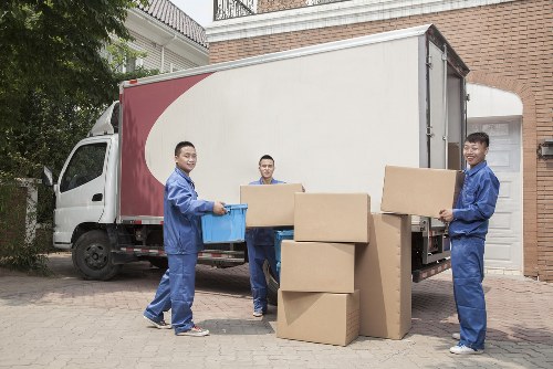 Moving team handling household items for a Finchley relocation