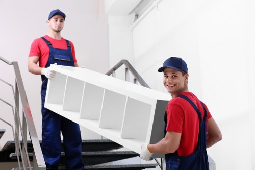 Removal team preparing belongings safely before a move in Finchley