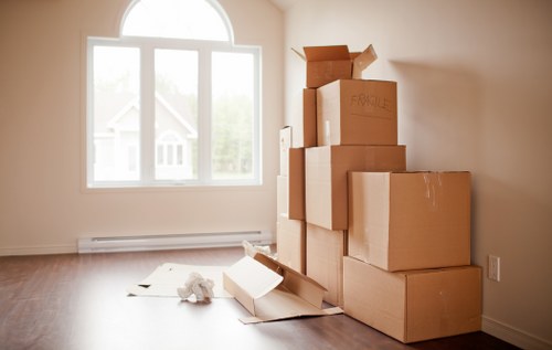 Prepared living room furniture ready for removal service in Finchley