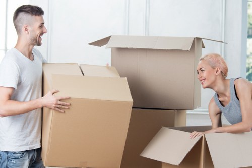 Supervisor reviewing safety checks with moving staff