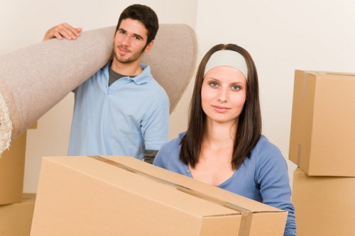 Supervisors reviewing health and safety procedures for a removal service