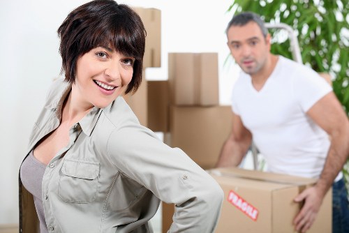 Packed boxes and small furniture ready for student removals